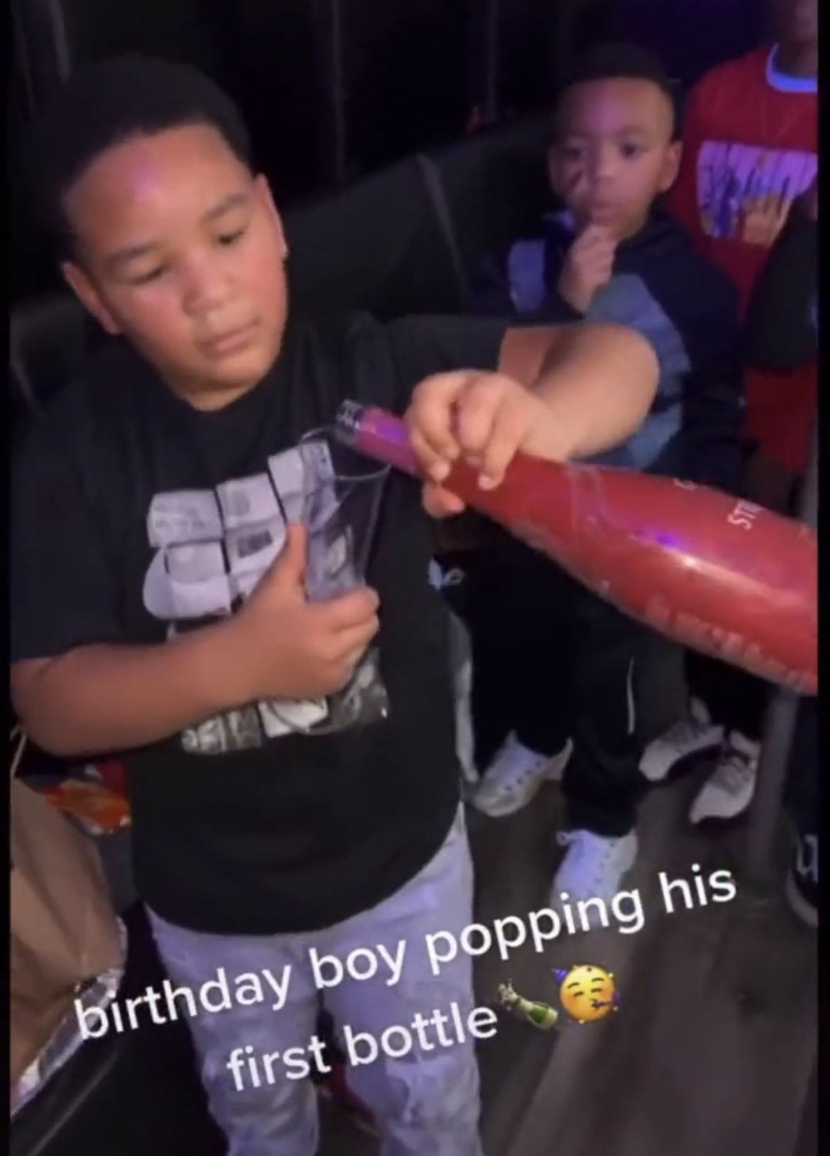 Mixed reactions as 8-year-old gets adult-themed party complete with stripper pole, bottles of non-alcoholic wine, and money to spray 