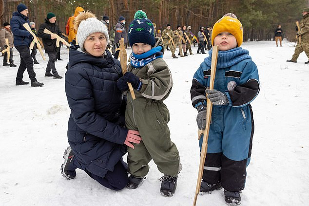 Ukrainian children as young as four are trained by military on how to shoot and defend their borders from Russian invasion (photos) 	