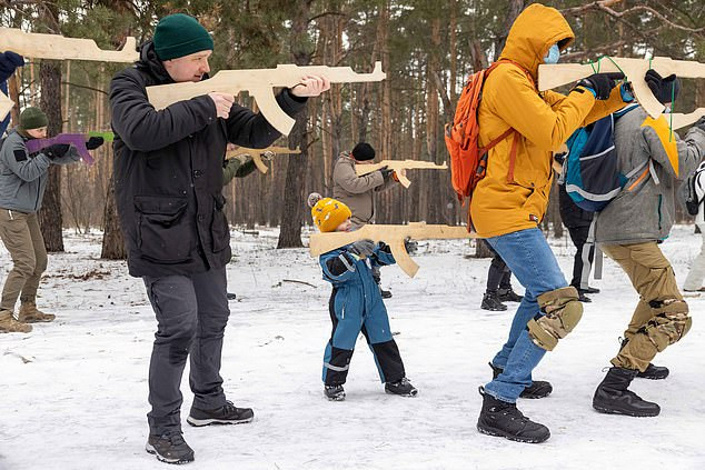 Ukrainian children as young as four are trained by military on how to shoot and defend their borders from Russian invasion (photos) 	