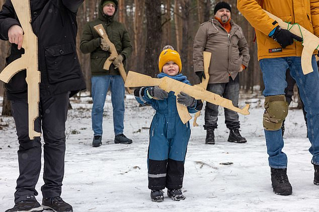 Ukrainian children as young as four are trained by military on how to shoot and defend their borders from Russian invasion (photos) 	