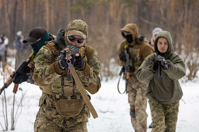 Ukrainian children as young as four are trained by military on how to shoot and defend their borders from Russian invasion (photos) 	