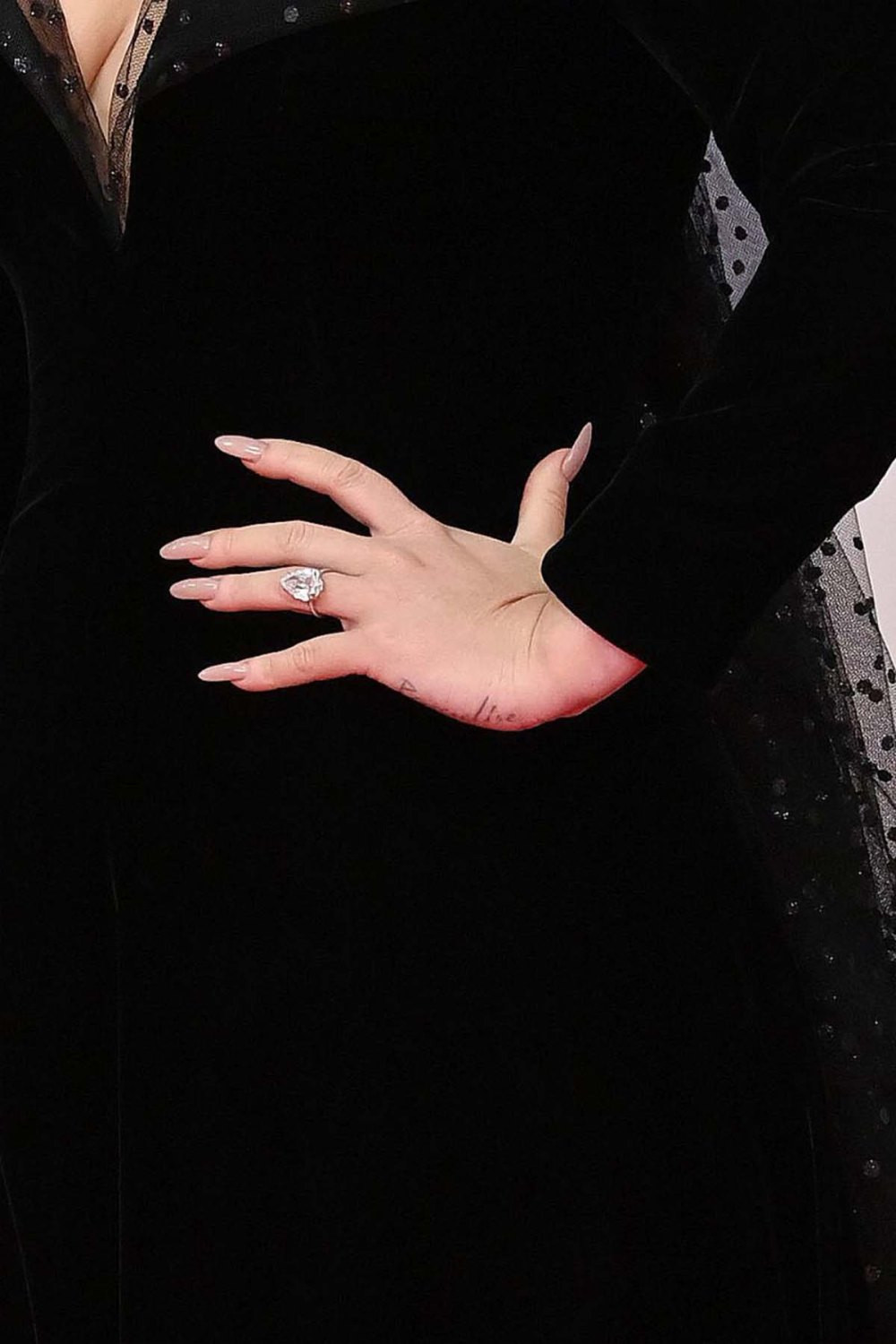 Adele sparks engagement rumors with diamond ring at Brit Awards 2022