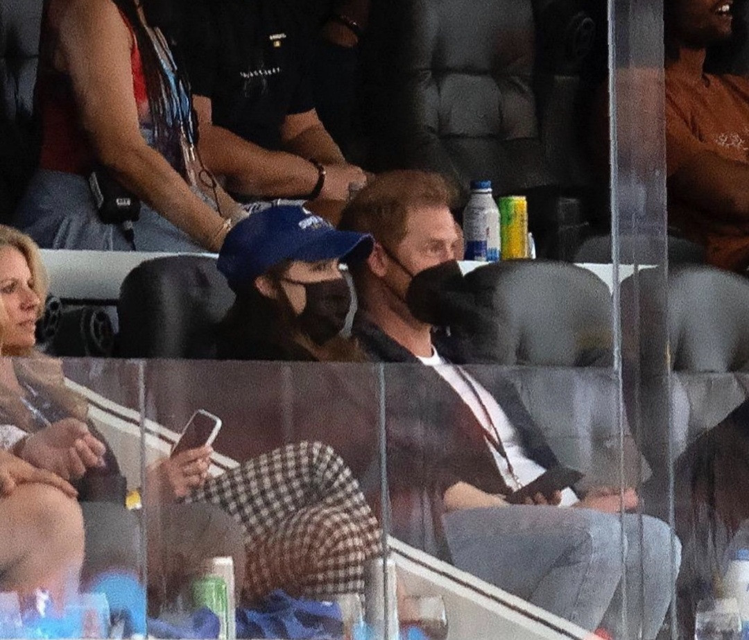 Prince Harry pictured at the Superbowl with his cousin Princess Eugenie