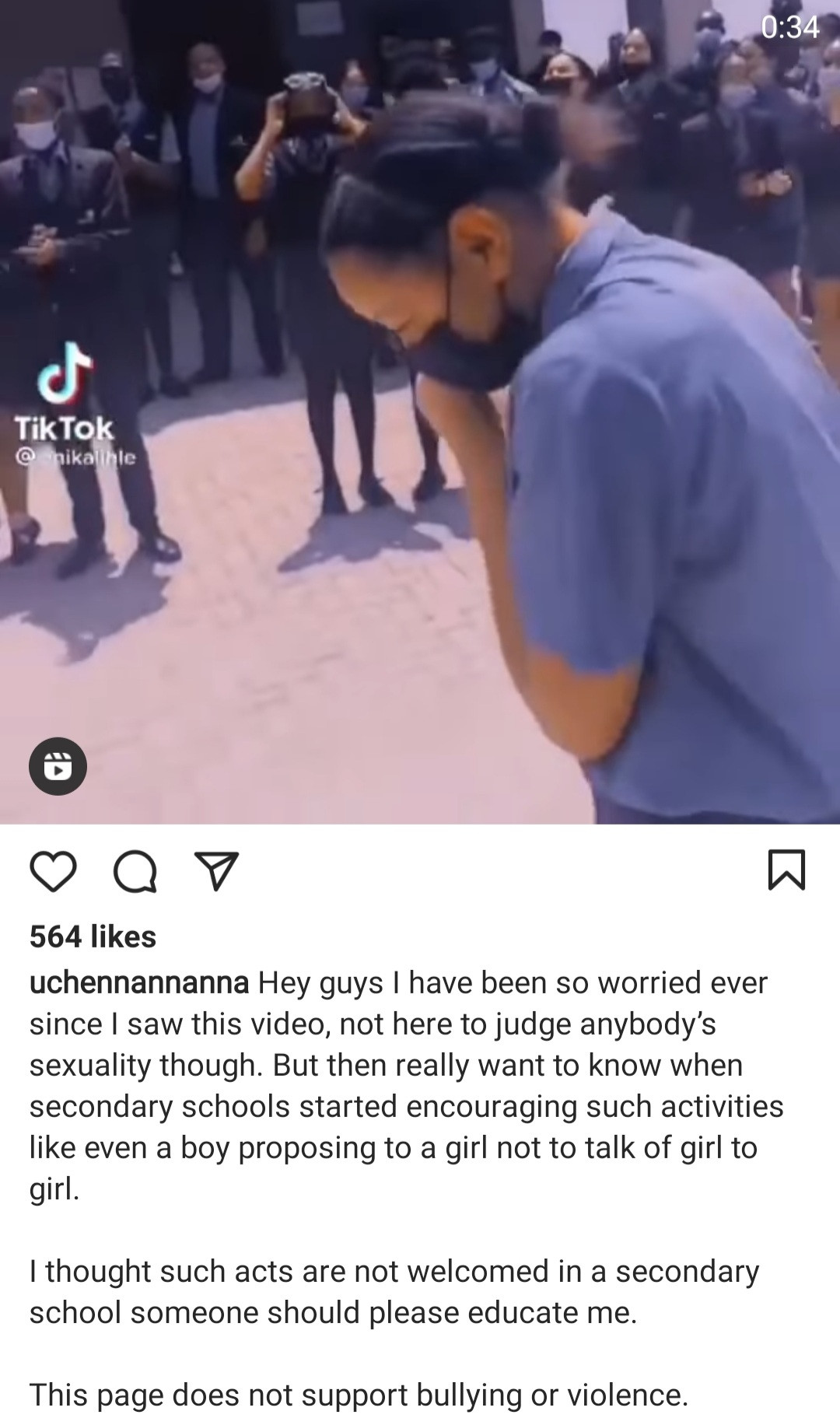 Outrage as secondary school student goes on her knees to propose to another female student while other students cheer (video)