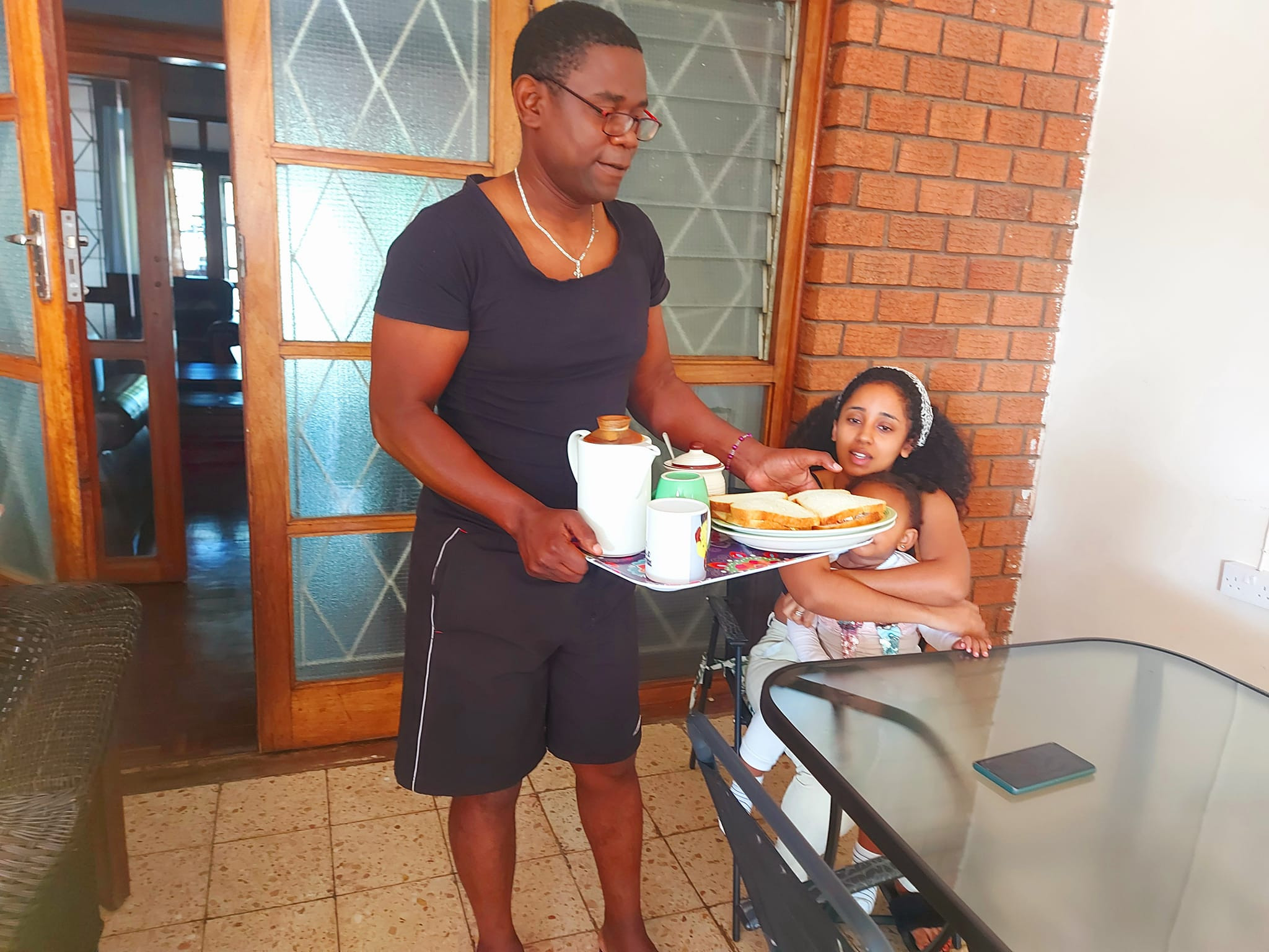 Zambian politician shares photos of him serving his wife breakfast 