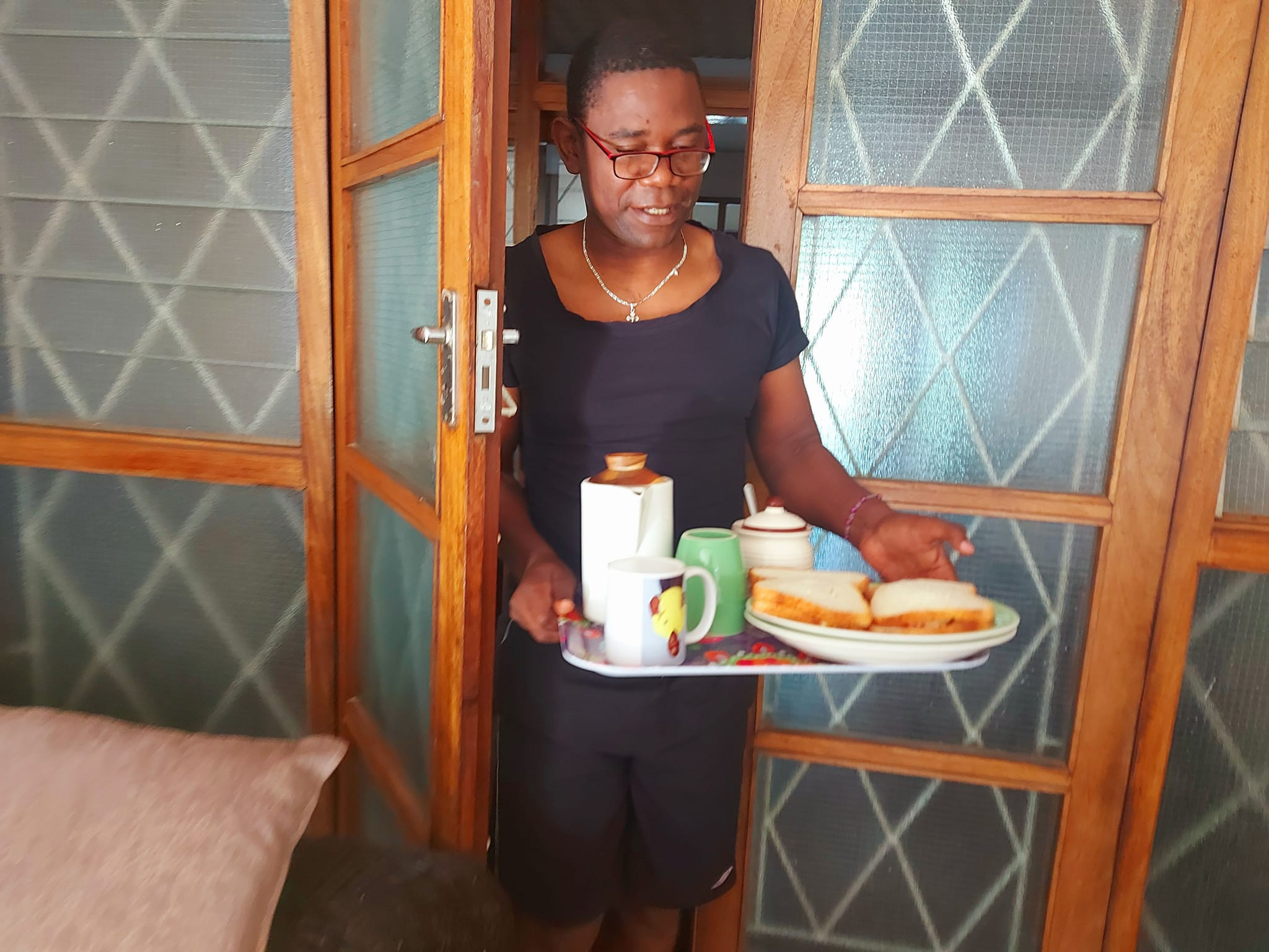 Zambian politician shares photos of him serving his wife breakfast 