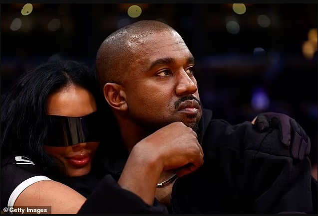 Kanye West all smiles as he sits courtside with his new girlfriend Chaney Jones at the Lakers after ex Kim Kardashian made her relationship with Pete Davidson Instagram official (photos) 