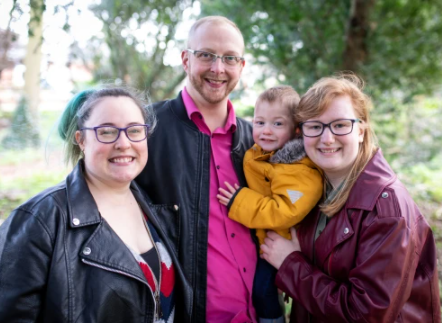 Married couple welcome a third partner into their home after the wife fell in love with a female colleague