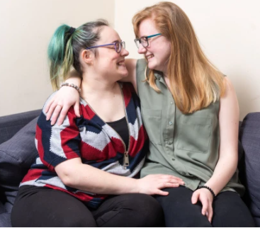 Married couple welcome a third partner into their home after the wife fell in love with a female colleague