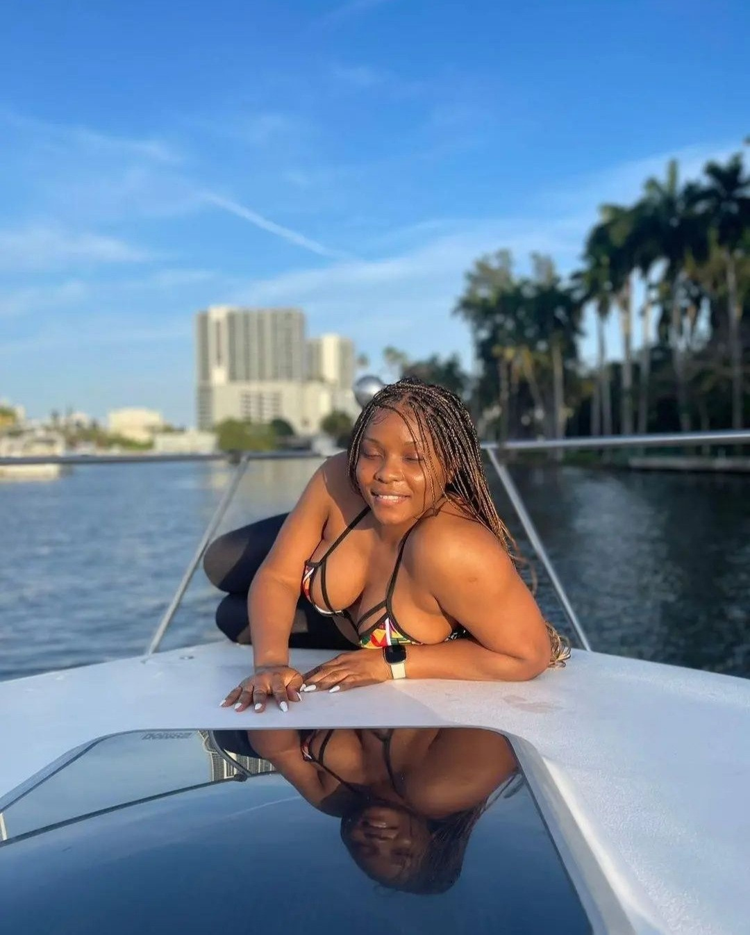 Yemi Alade puts her hot body on display as she  enjoys a yacht ride with friends in Florida (photos)