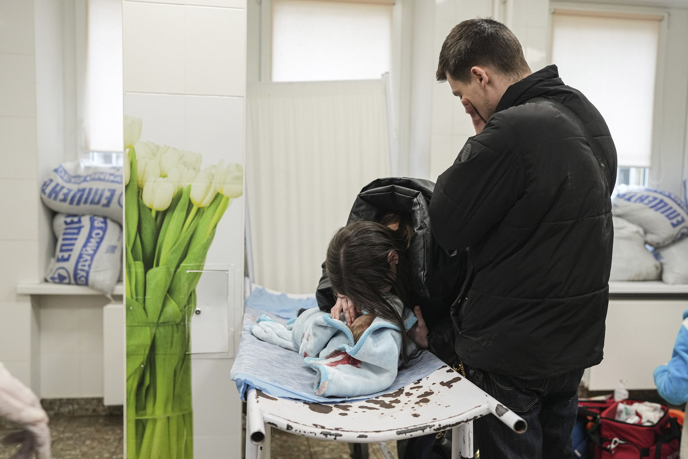 Parents in tears after their 18-month-old baby is killed in Russian shell attack (photos)