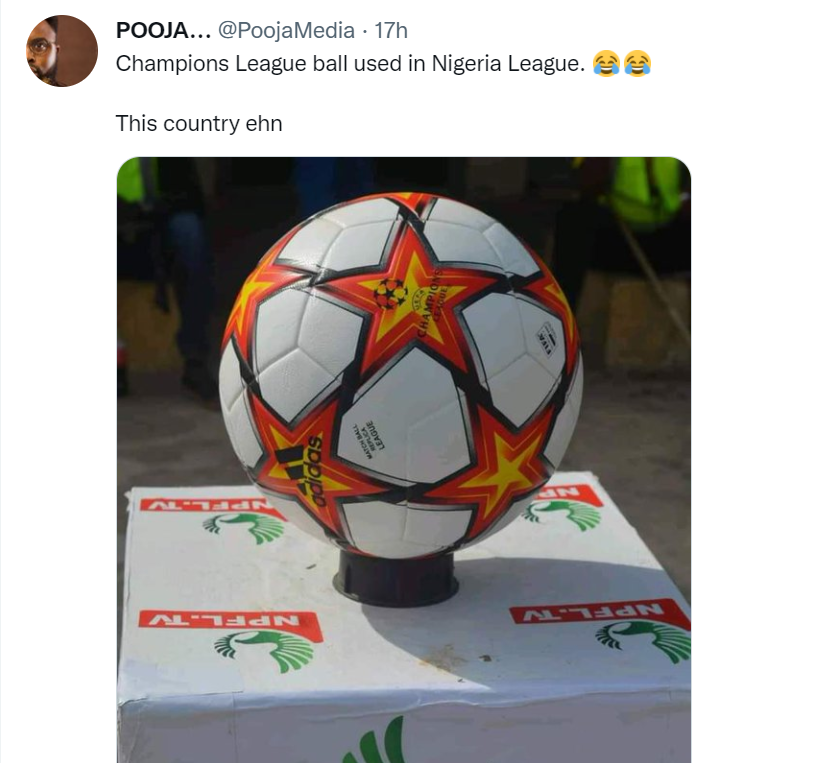 Sports journalist shows off the football used in Nigerian league